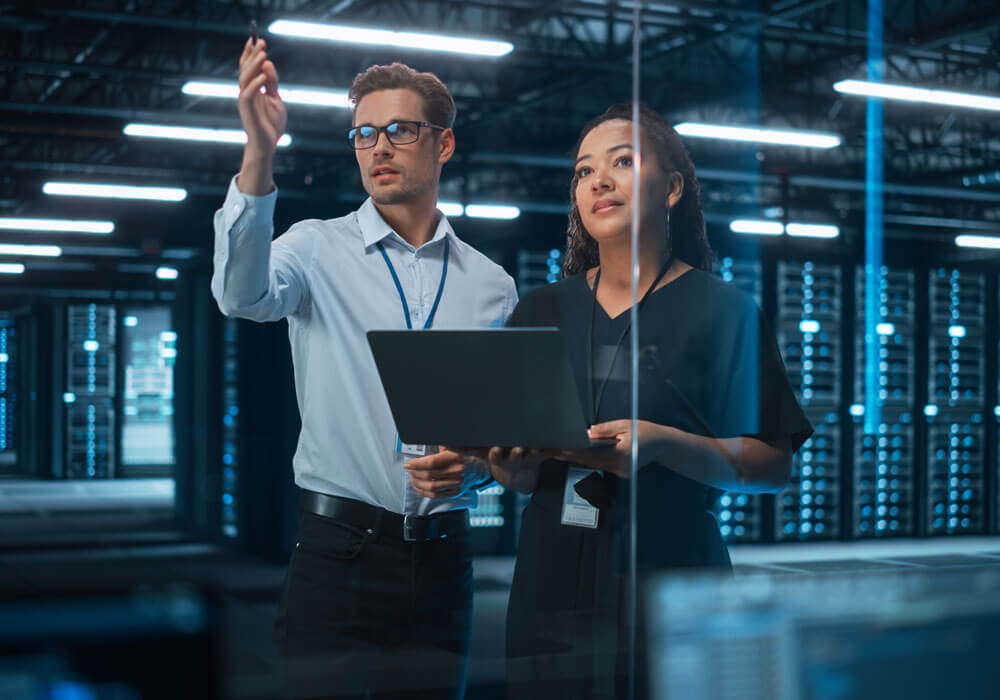 person organizing files on laptop