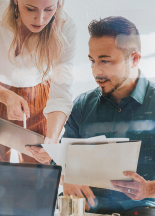 person organizing files on laptop